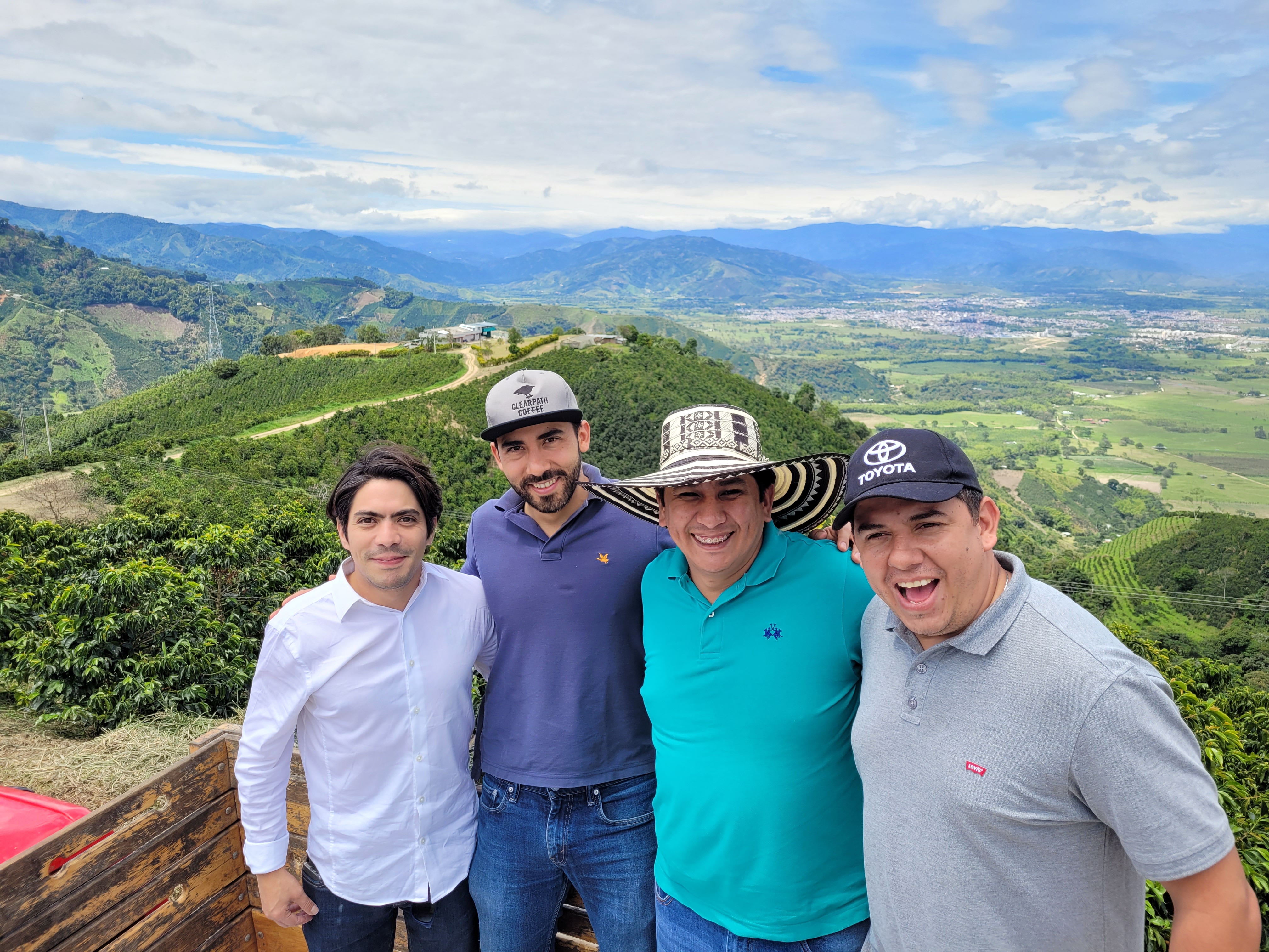 From left to right, Ernesto of the CFC with Vicente of Clearpath and coffee farmers Rodrigo and Elkin